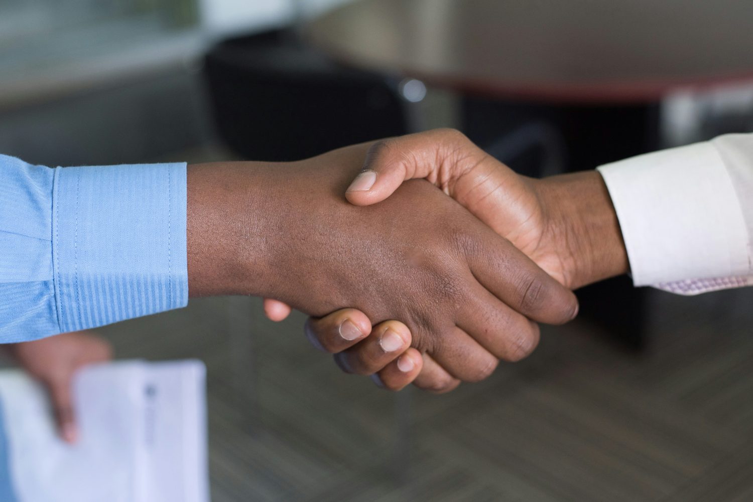 Business handshake at a meeting